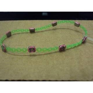    Braced Lets Neon Pink & Yellow Braces Bracelet: Toys & Games