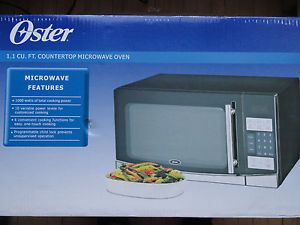 http://img0129.popscreencdn.com/182378111_oster-11-cu-ft-1000w-countertop-microwave-oven-ogb61102.jpg